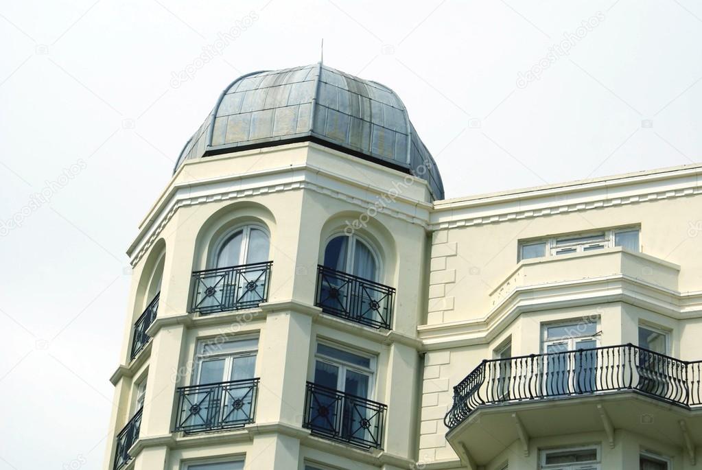 domed roof and arched windows with balconies