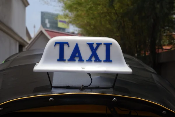 Beyaz taksi işareti — Stok fotoğraf