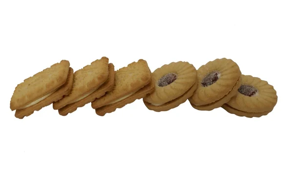 Custard cream and raspberry jam biscuits or cookies — Stock Photo, Image