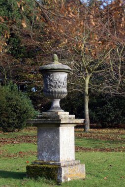 sculptured urn. sculptured vase. garden ornament