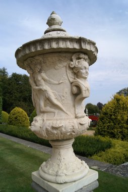 sculptured urn. sculptured vase. garden ornament