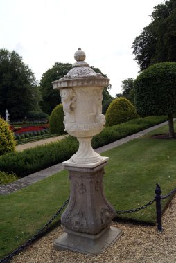 sculptured urn. sculptured vase. garden ornament