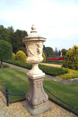 sculptured urn. sculptured vase. garden ornament