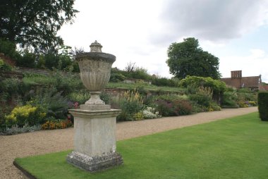 sculptured urn. sculptured vase. garden ornament