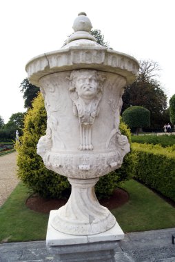 sculptured urn. sculptured vase. garden ornament