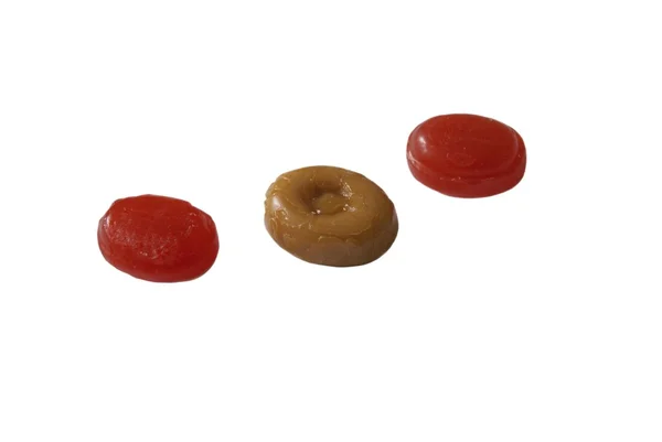 Karamelové a jahodové bonbóny. sladkosti. cukrovinky — Stock fotografie