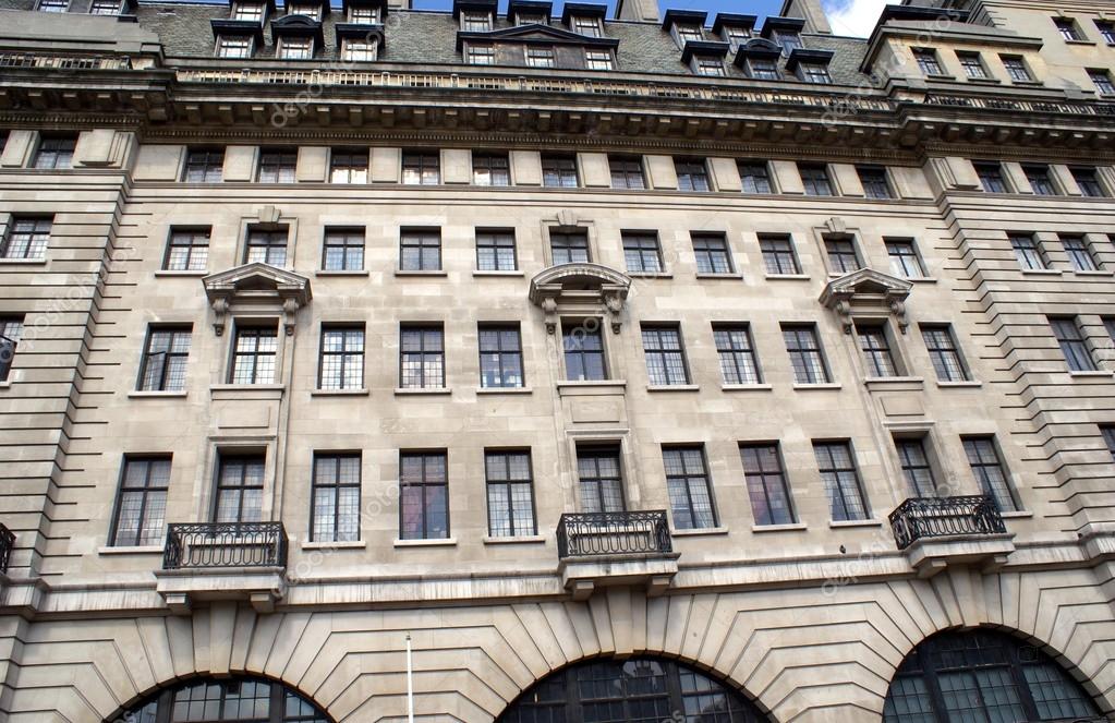 Old Facade Of Arched Windows Window Balconies And Dormer Windows