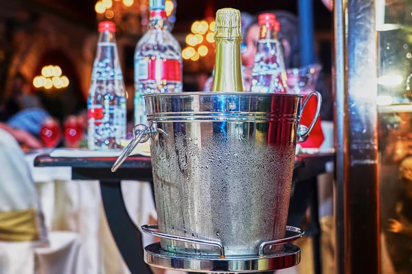 Misted bucket with champagne