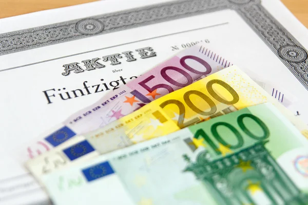 Share with Euro banknotes — Stock Photo, Image