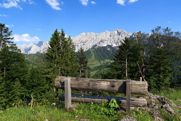 Bench and Wild Kaiser mountains — Stock Photo, Image