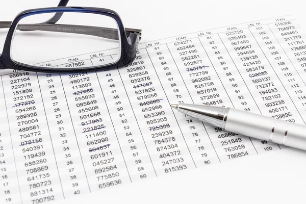 Glasses, ballpoint pen and TAN list for online banking — Stock Photo, Image