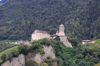 Tyrol Castle (Schloss Tirol) and vineyards in the mountains of Tirol (Dorf Tirol) in South Tyrol, Italy