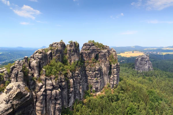 Panorama with Group of rocks Schrammsteine and Falkenstein seen from viewing point in Saxon Switzerland — Stock Photo, Image