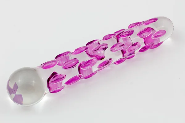 Sex Toy - Isolated Glass dildo with pink knobs and white background