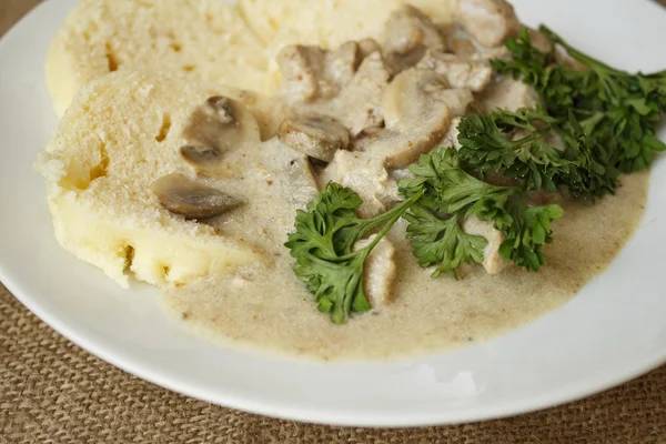 Pork dumplings mushroom cream sauce detail — Stock Photo, Image