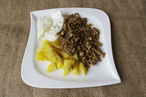 Soy granules white plate potatoes recipe — Stock Photo, Image