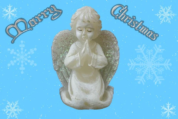 Merry christmas blue background with a praying angel — Stock Photo, Image