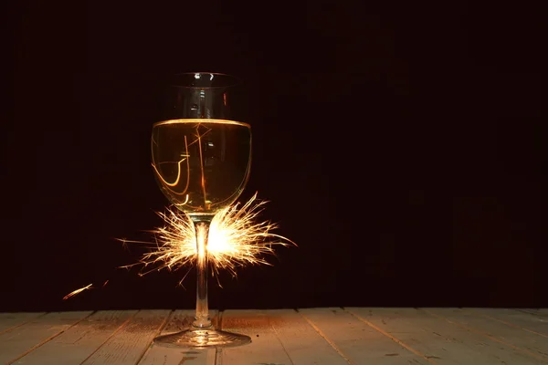 Sweet cocktail. Sparkler with champagne glass — Stock Photo, Image