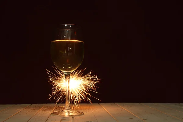 Sweet cocktail. Sparkler with champagne glass — Stock Photo, Image