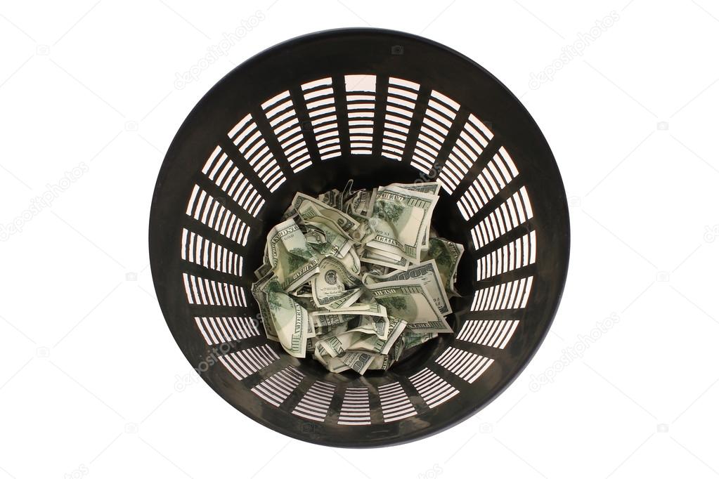 Money in the garbage can with clipping path