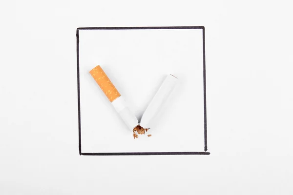 Broken cigarette like tick mark. Stop smoking concept. — Stock Photo, Image