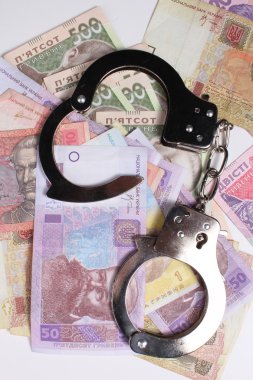 Suçlu. Kelepçe ve para. Bozulması