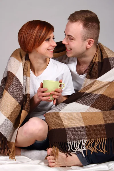 Young love couple  under the covers — Stock Photo, Image