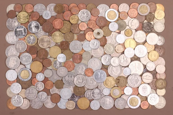 A collection of old coins from around the world — Stock Photo, Image