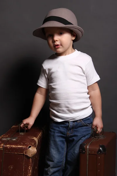 Niño en sombrero con bolsa Imagen De Stock