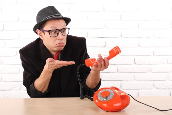 Young man talking on a vintage telephone, nice emotion — Stock Photo, Image