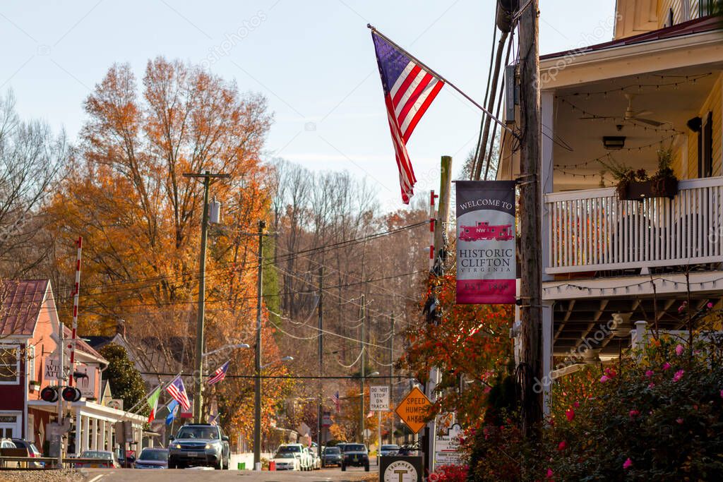 Clifton, VA, USA 11/14/2020: Historic Clifton, established in 1862, is a small  picturesque town in Fairfax county with many 19th century houses. Image features an autumn city scape.