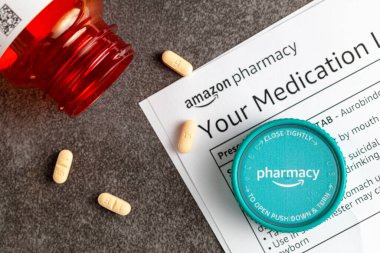 Clarksburg, MD, USA 03-26-2021: Online shopping giant Amazon.com launched its pharmacy branch. Customers ask their doctors to send prescriptions to amazon.com and medications are delivered free.