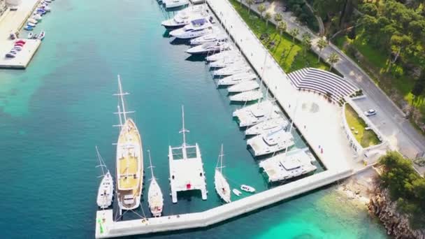 Solta, Croatia - July 5 2016: Aerial view of Sailboats in marina in small village Maslinica in Solta Island, Croatia — Stock Video