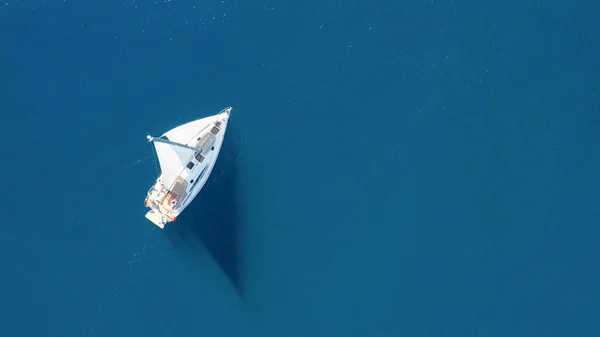 Top view of sailing luxury yacht at opened sea at sunny day in Croatia