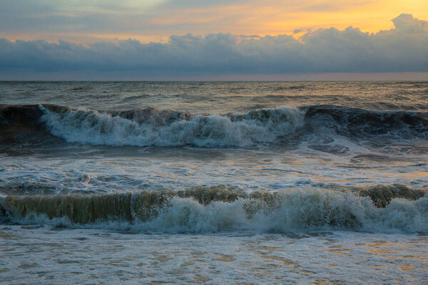  Beautiful sunset over the sea during a storm