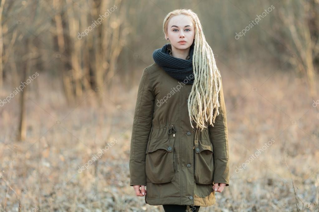 Young Beautiful Blonde Hipster Woman In Scarf And Parka With