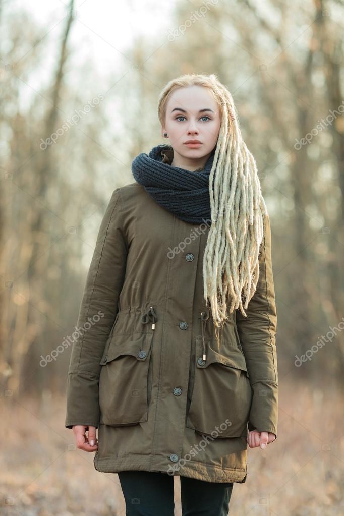 Young Beautiful Blonde Hipster Woman In Scarf And Parka With