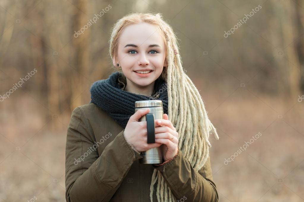 Young Beautiful Blonde Hipster Woman In Scarf And Parka With