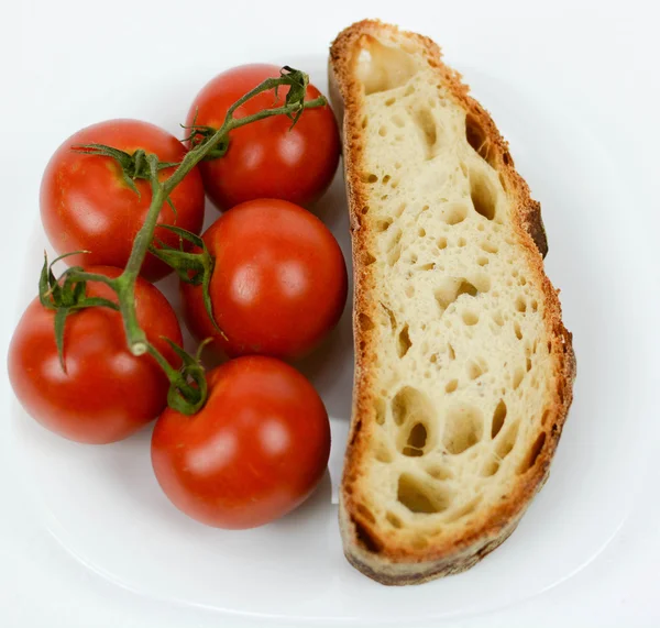 Pão de dieta mediterrânea e tomate — Fotografia de Stock