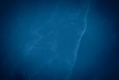 Eski grunge mavi beton desen duvar arkaplanı vignette ile.