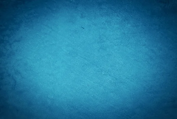 Eski grunge mavi beton desen duvar arkaplanı vignette ile.