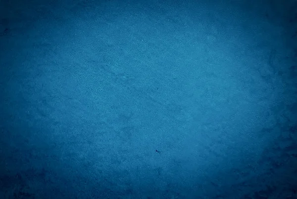 Eski grunge mavi beton desen duvar arkaplanı vignette ile.