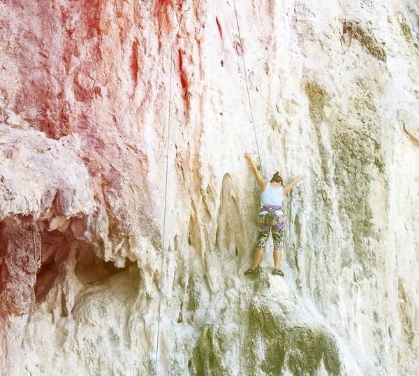 Retro Color of Rock climbers climbing the wall on Railay beach,