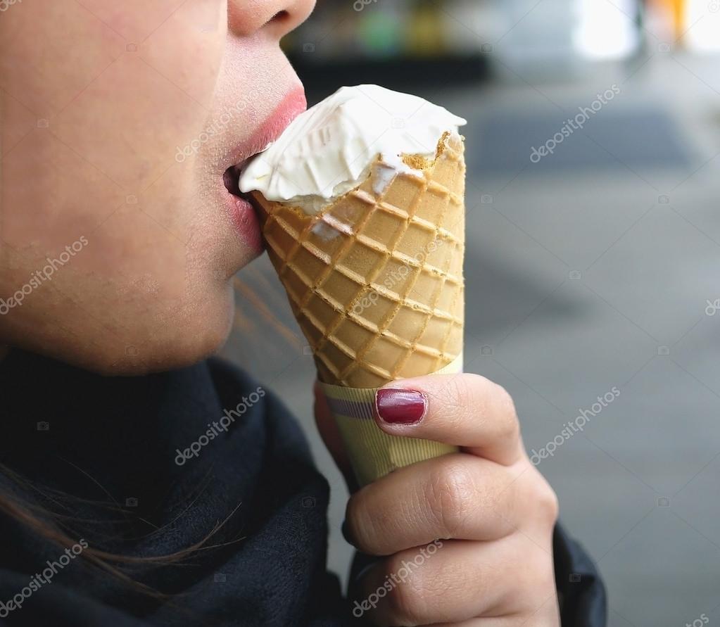 Half Face Of Asian Woman Eating Ice Cream Cone Stock Photo C Benzoix