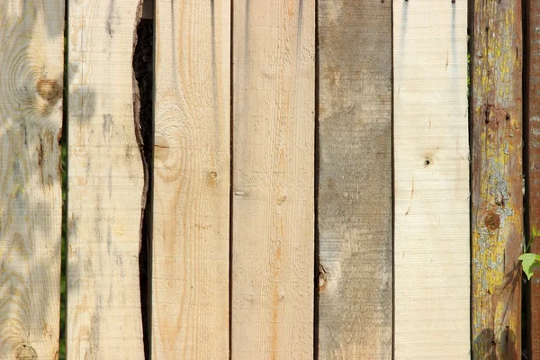 Bright wooden old fence boards — Stock Photo, Image