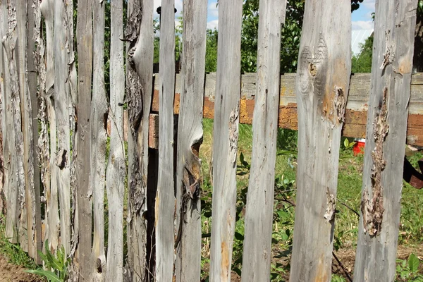 Old wooden fence from boards — Stock Photo, Image