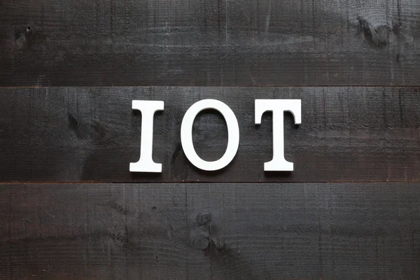 A betűszó Iot Internet dolog a sötét háttér — Stock Fotó