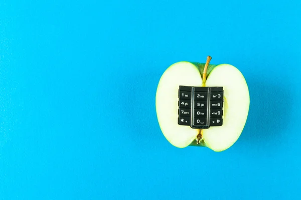 Alphanumeric apple on blue background — Stock Photo, Image