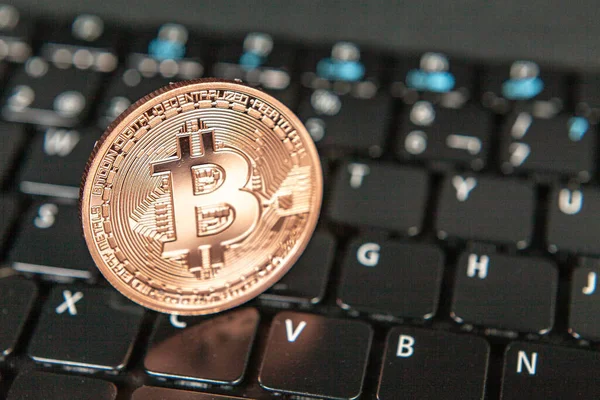 Photograph Bitcoin Coins Symbolizing Financial Market Cryptocurrencies Colored Background Keyboard — Stock Photo, Image
