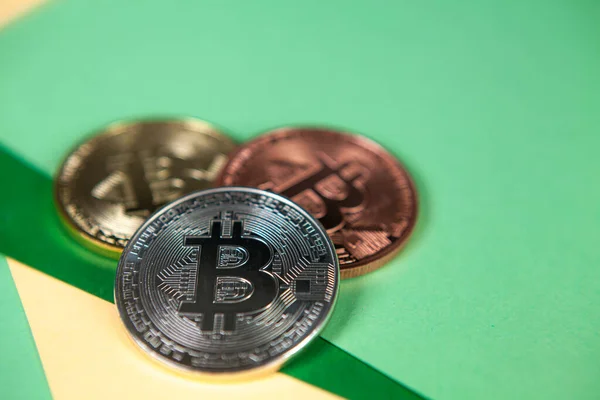 Photograph Bitcoin Coins Symbolizing Financial Market Cryptocurrencies Colored Background People — Stock Photo, Image